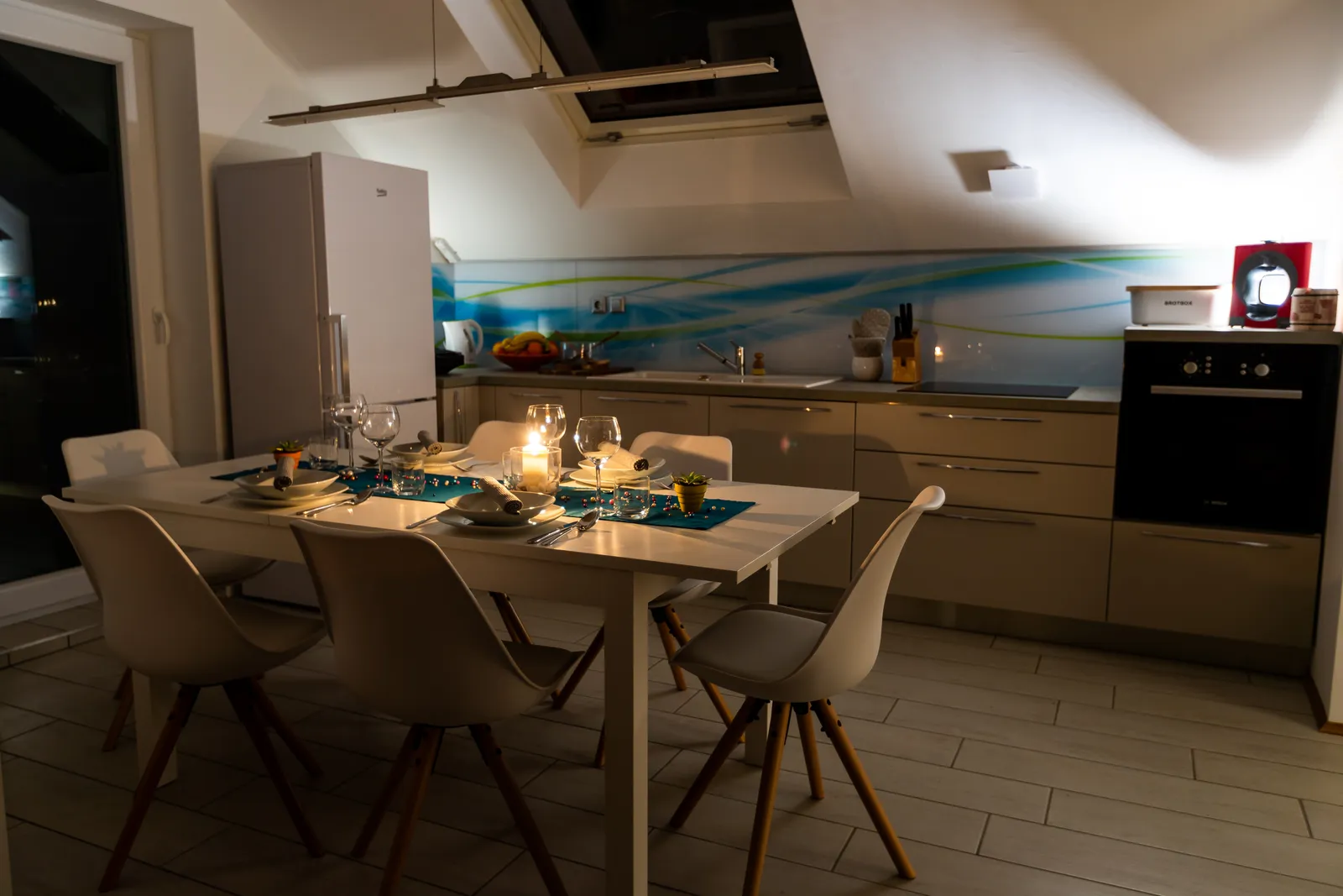 Kitchen of apartment Mia in the evening light